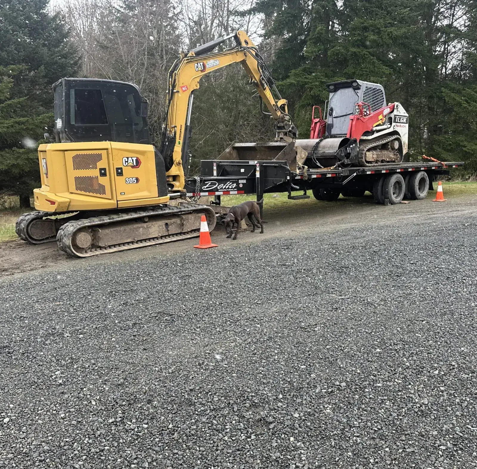 Holmes Earth Construction excavator working on a job site